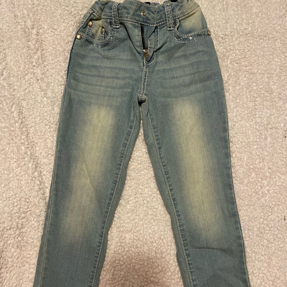 Girls light blue jeans